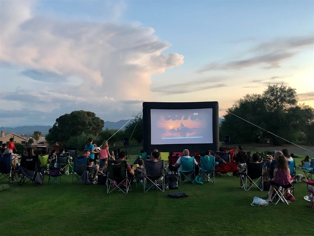 Experience the joy of watching 'Turning Red' under the stars at our outdoor movie night.